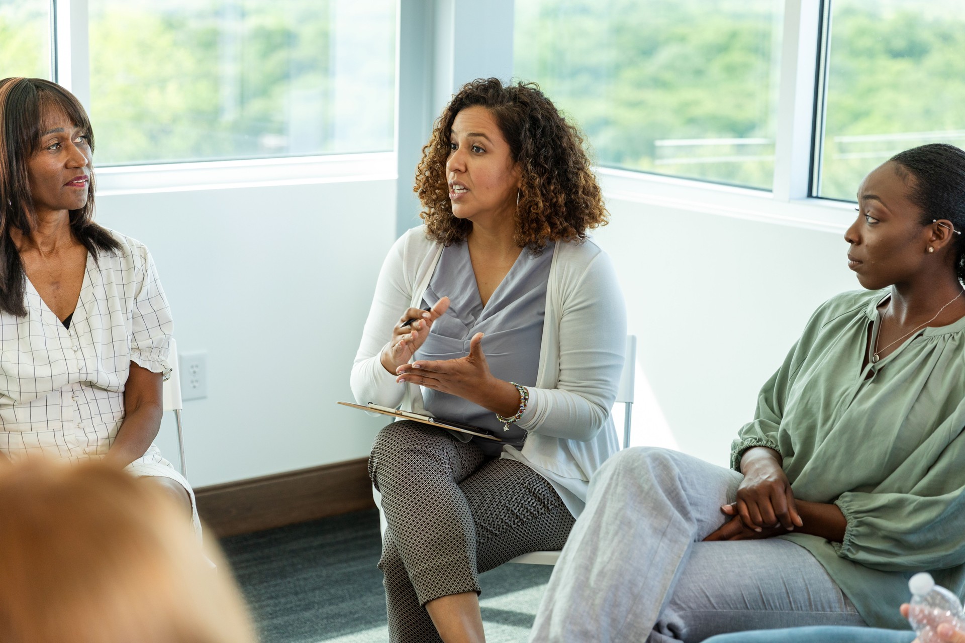 Group Therapy Session: Women Sharing Experiences and Support